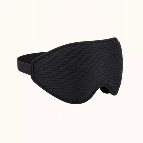 Salutive contoured sleep mask in black on a white background
